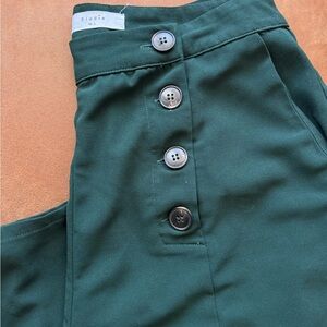 Elodie, high wasted, flare dress pants, forest green color.